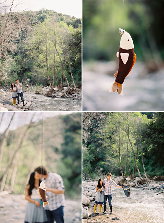 Couple posing with fishing props