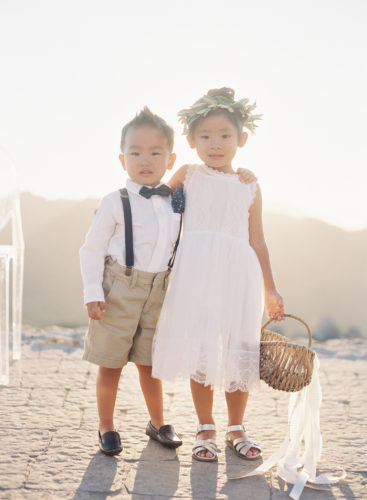 flower girl and ring bearer at sunset