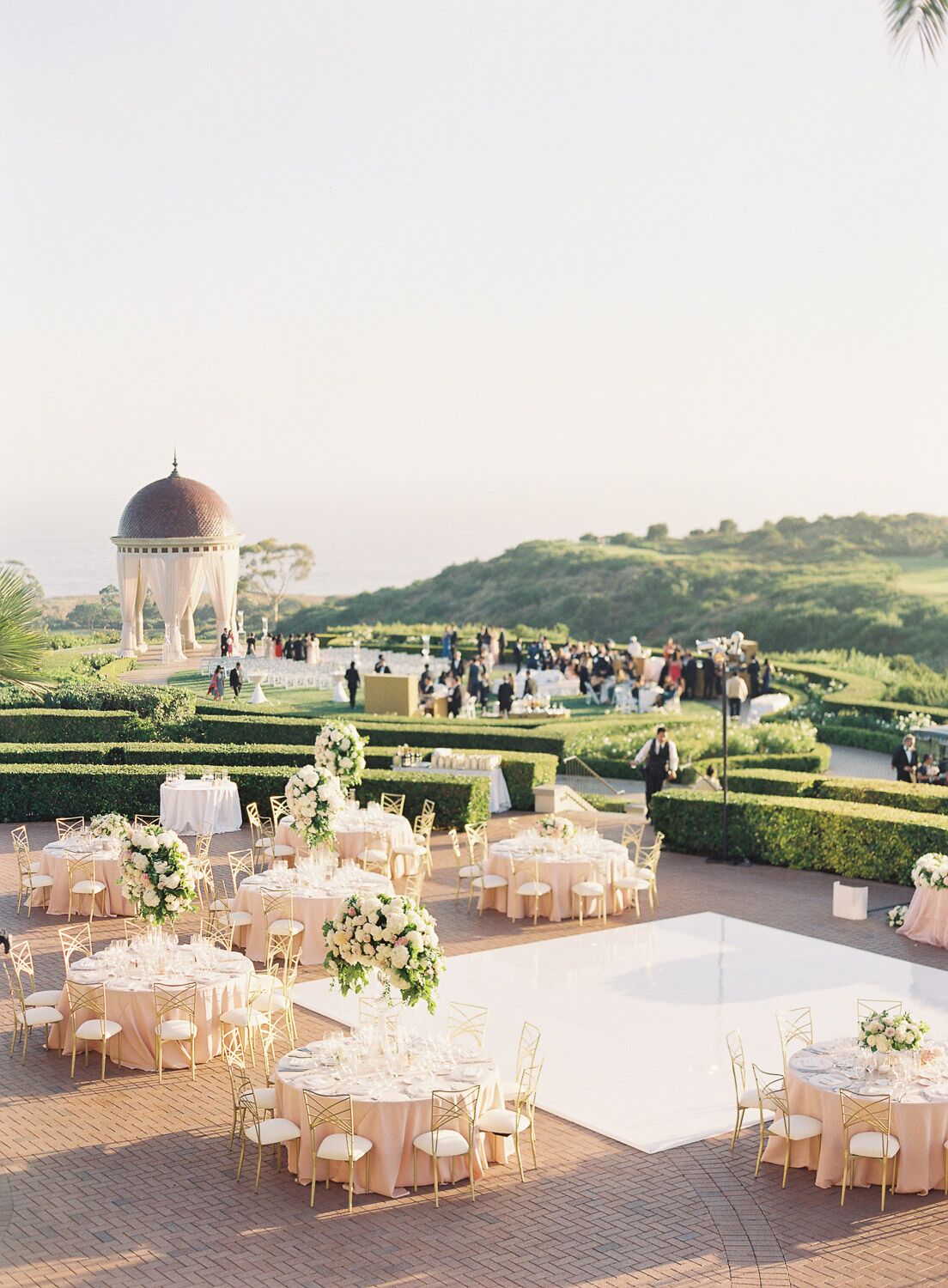 Overhead shot of outdoor reception space with round tables