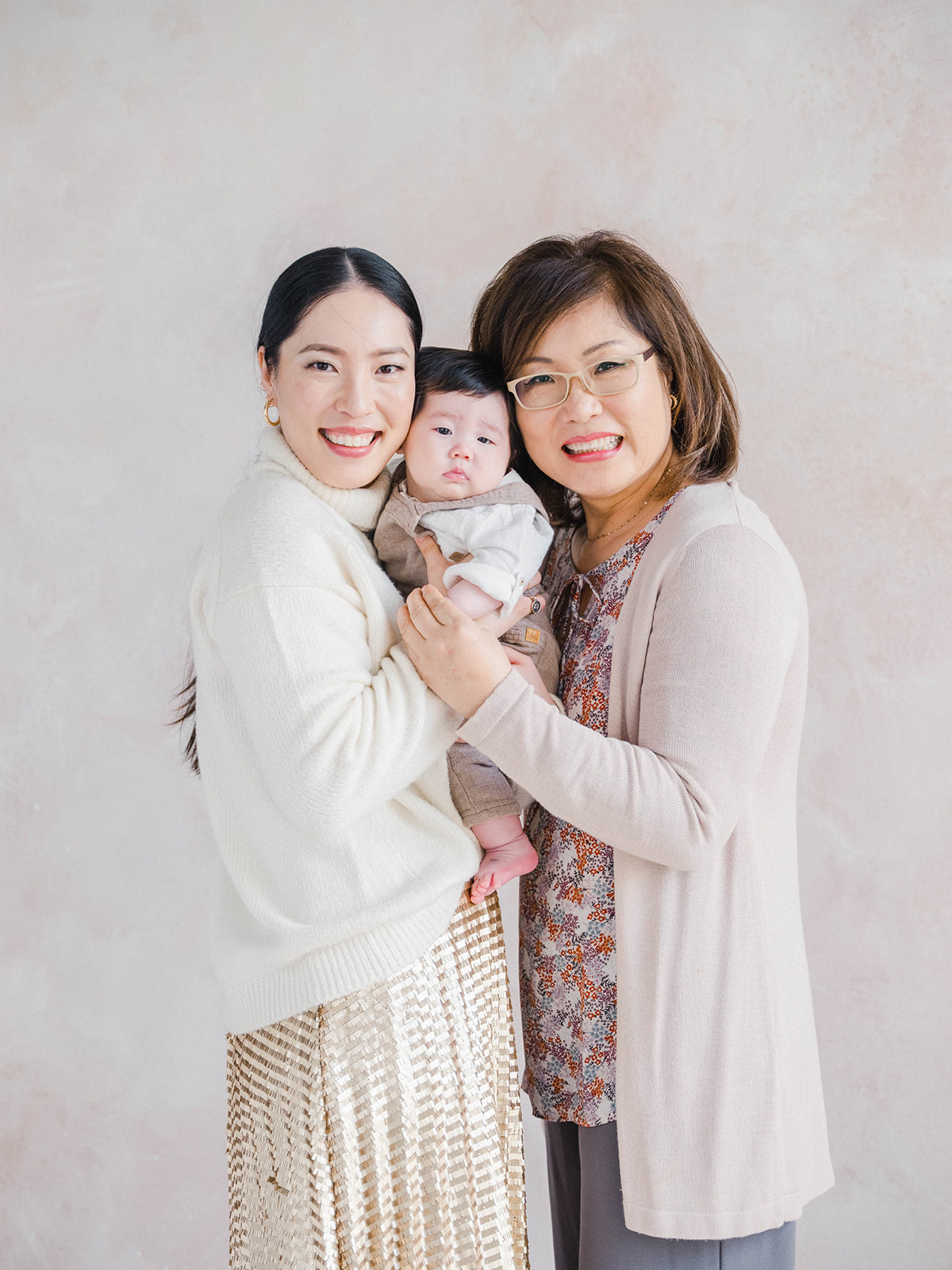 photo of three generations, grandmother, daughter and baby