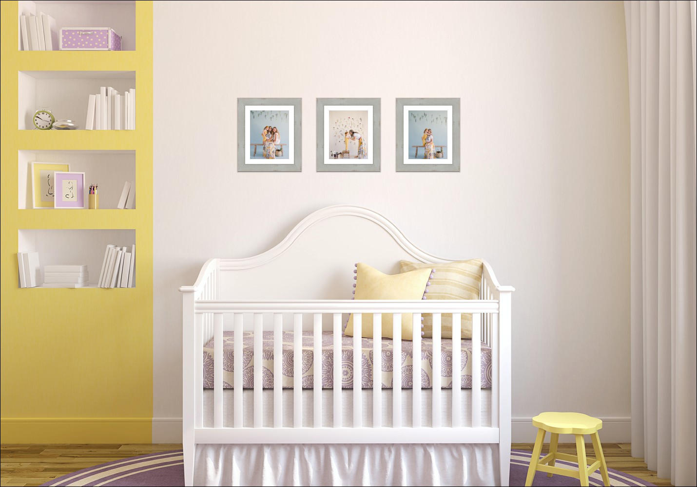 Photo of yellow nursery with three framed photos above the crib
